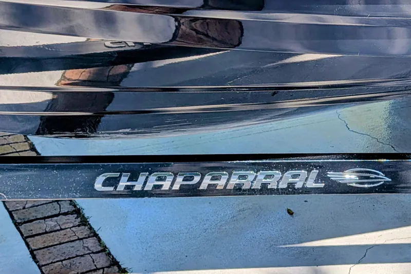 Slide: The Image of Chaparral Vortex 223 VRX 2017 boat logo on sleek, reflective surface. - 18