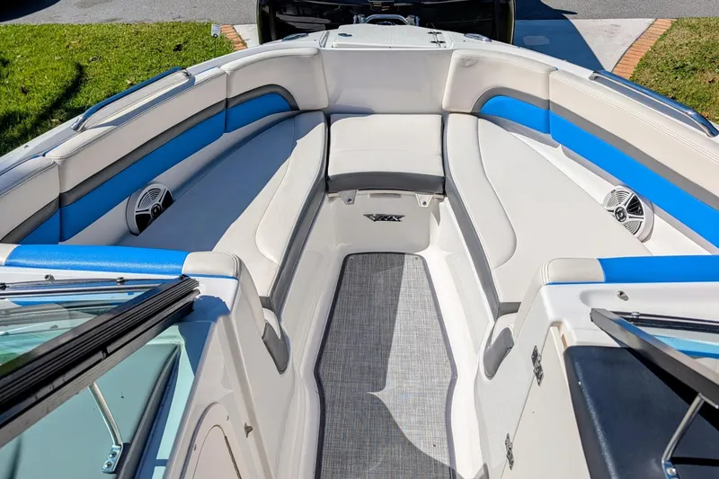 Slide: The Image of 2017 Chaparral Vortex 223 VRX boat interior with blue and white seating. - 7
