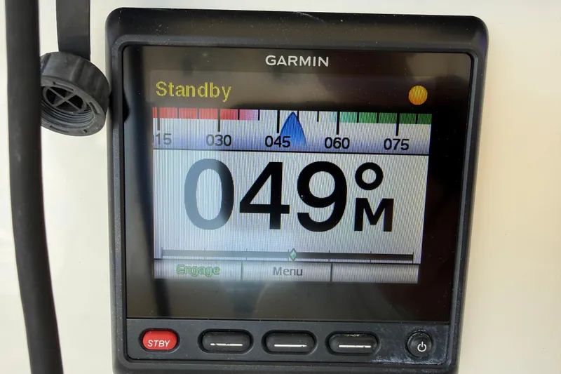 Slide: The Image of Garmin marine display showing 49 meters on a 2017 Cobia 296 Center Console. - 13