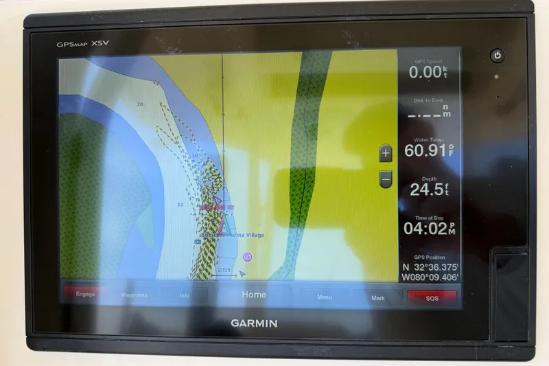 Slide: The Image of Garmin GPS display on 2017 Cobia 296 Center Console, showing navigation and water data. - 8
