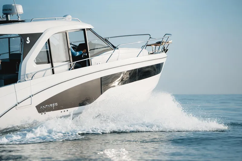 Slide: The Image of 2025 Beneteau Antares 9 cruising on open water, showcasing sleek design and performance. - 7