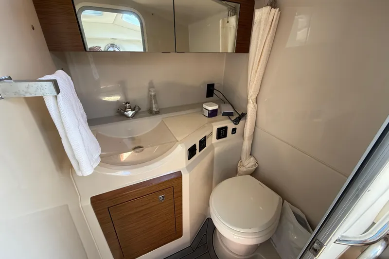 Slide: The Image of Luxurious bathroom in 2015 Cruisers Yachts 338 Bow Rider with modern amenities. - 20