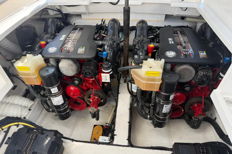 Slide: The Image of Engine compartment of a 2015 Cruisers Yachts 338 Bow Rider with dual Volvo Penta V8 engines. - 21