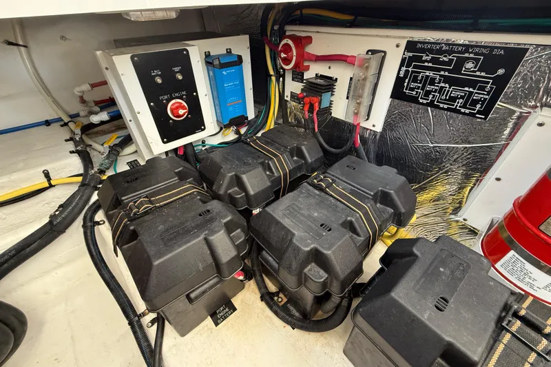Slide: The Image of Engine compartment of 2015 Cruisers Yachts 338 Bow Rider with battery setup and wiring diagram. - 23