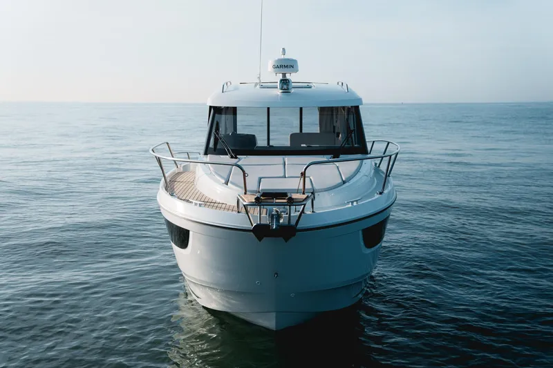 Slide: The Image of 2025 Beneteau Antares 9 yacht on calm sea, front view. - 3