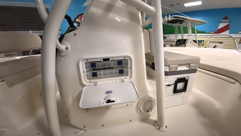 Slide: The Image of Interior view of a Boston Whaler 190 Montauk with storage and seating. - 10
