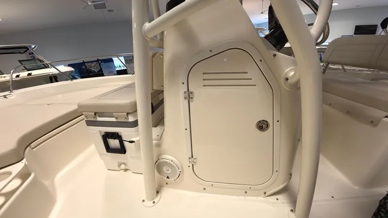 Slide: The Image of The image shows the cockpit of a Boston Whaler 190 Montauk with storage and seating. - 11
