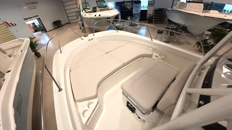 Slide: The Image of Interior view of a Boston Whaler 190 Montauk with seating area and storage. - 13