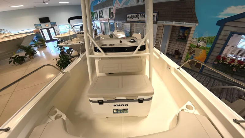 Slide: The Image of Interior view of a Boston Whaler 190 Montauk with cooler and helm console. - 15