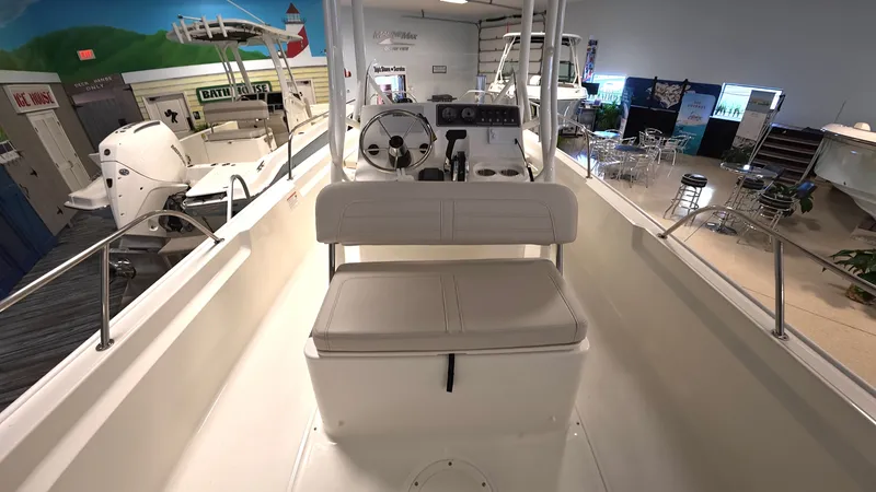 Slide: The Image of Interior view of a Boston Whaler 190 Montauk with helm and seating area. - 5