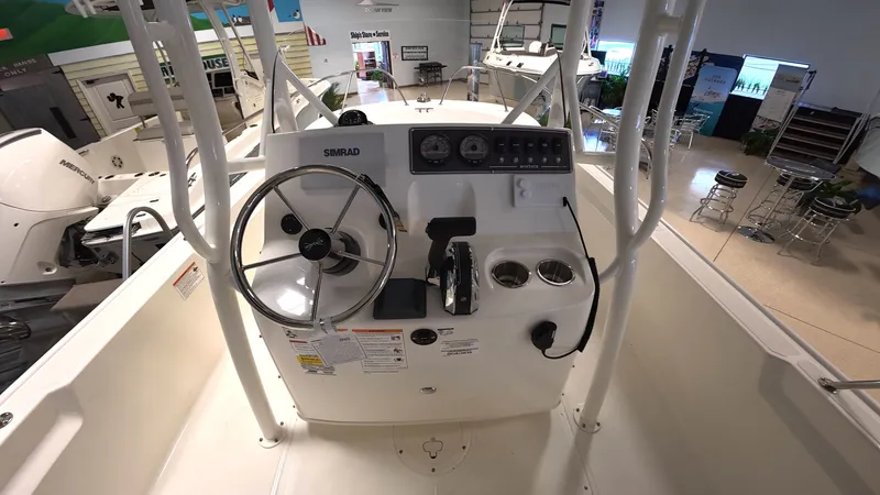 Slide: The Image of Interior view of a Boston Whaler 190 Montauk with helm and instruments. - 8
