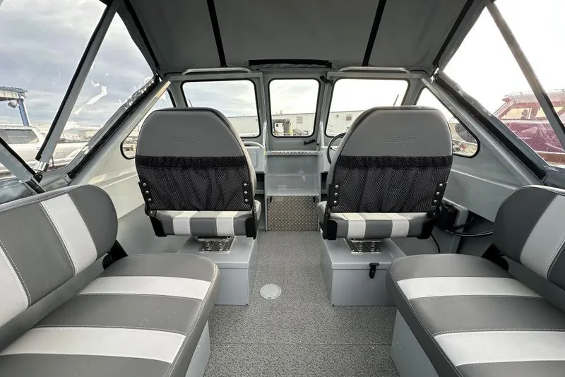 Slide: The Image of 2026 Hewescraft 160 Sportsman interior with gray seating and modern design. - 3