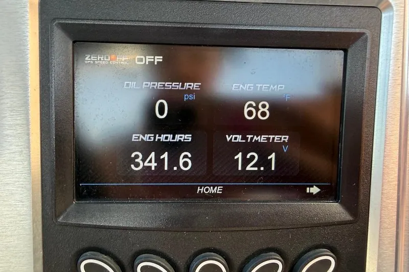 Slide: The Image of Dashboard display of a 2018 MasterCraft NXT22 showing engine metrics. - 12