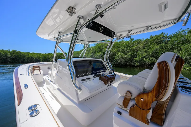 Slide: The Image of 2025 Valhalla V-37 boat interior with sleek design, advanced controls, and luxurious seating. - 11