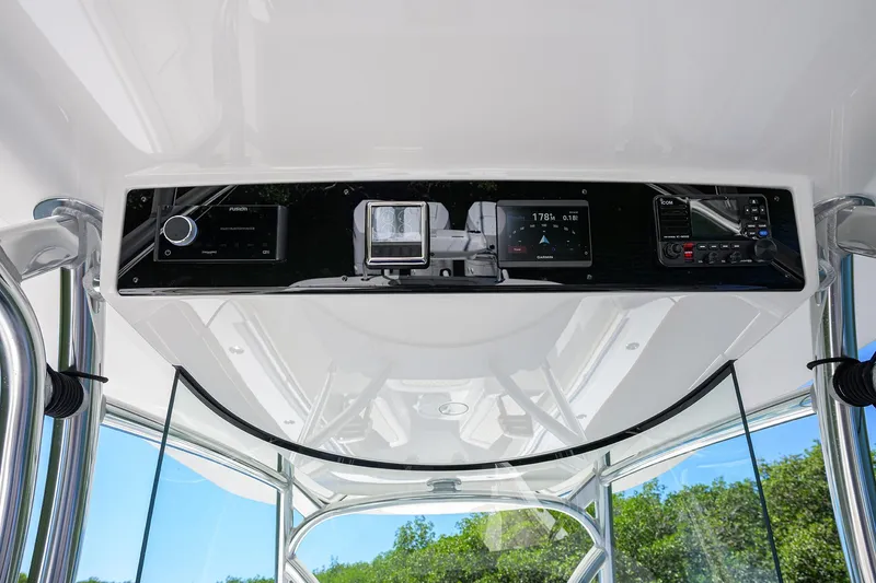 Slide: The Image of 2025 Valhalla V-37 boat dashboard with navigation and communication systems. - 14