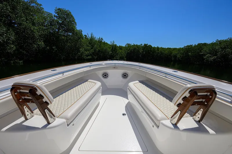 Slide: The Image of Luxurious seating on 2025 Valhalla V-37 boat under clear blue sky. - 18