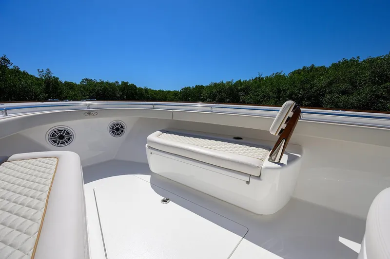Slide: The Image of Luxurious seating on 2025 Valhalla V-37 boat under clear blue sky. - 21