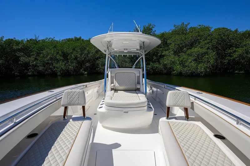 Slide: The Image of 2025 Valhalla V-37 boat interior with luxurious seating and sleek design. - 25