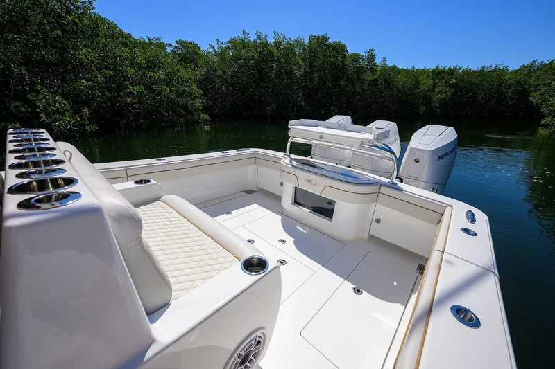 Slide: The Image of Luxurious 2025 Valhalla V-37 boat interior with seating and dual Mercury engines. - 33