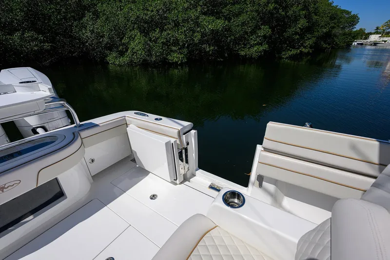 Slide: The Image of Luxurious 2025 Valhalla V-37 boat interior with plush seating and scenic water view. - 41