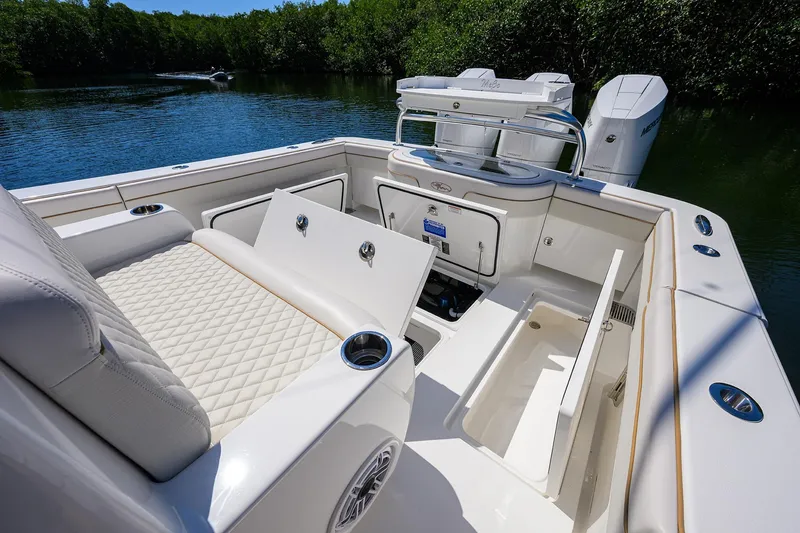 Slide: The Image of Luxurious 2025 Valhalla V-37 boat interior with plush seating and storage compartments. - 42