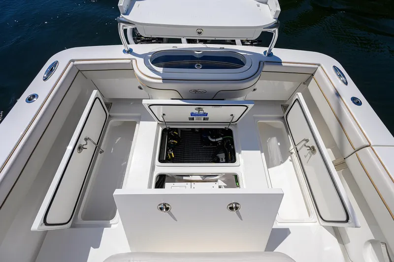 Slide: The Image of 2025 Valhalla V-37 boat deck with open storage compartments and seating. - 43
