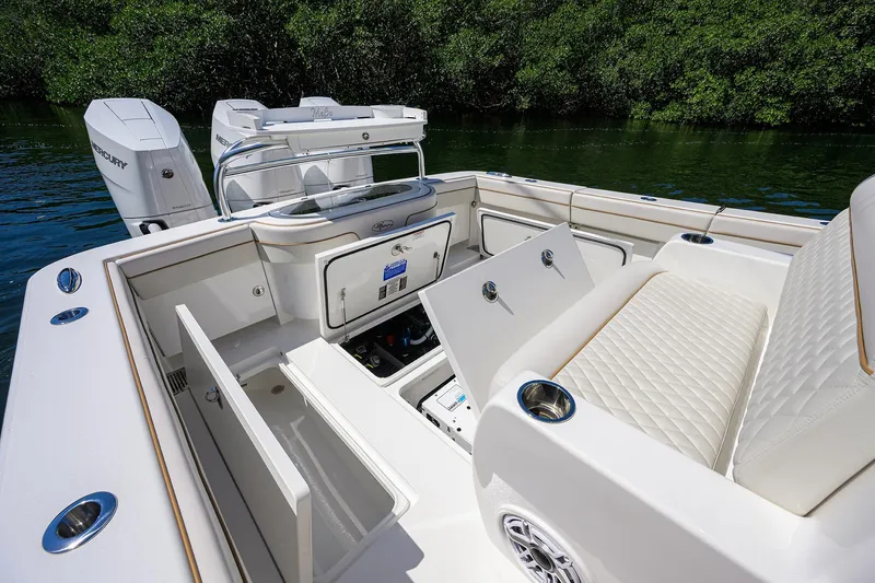 Slide: The Image of 2025 Valhalla V-37 boat interior with storage compartments and seating. - 44