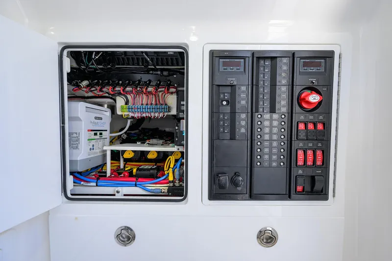 Slide: The Image of Electrical panel of 2025 Valhalla V-37 boat, showcasing wiring and control systems. - 53