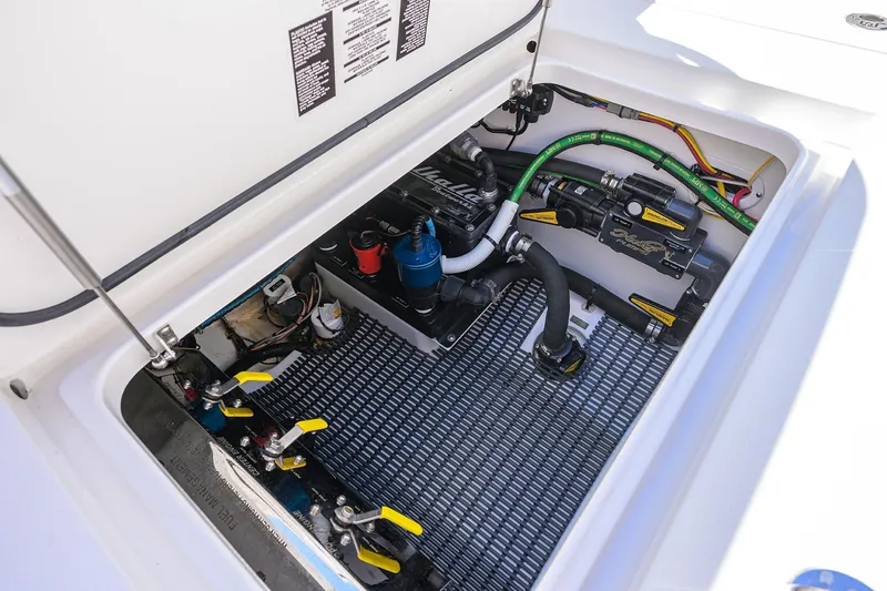 Slide: The Image of Engine compartment of 2025 Valhalla V-37 boat, showcasing mechanical components and wiring. - 55