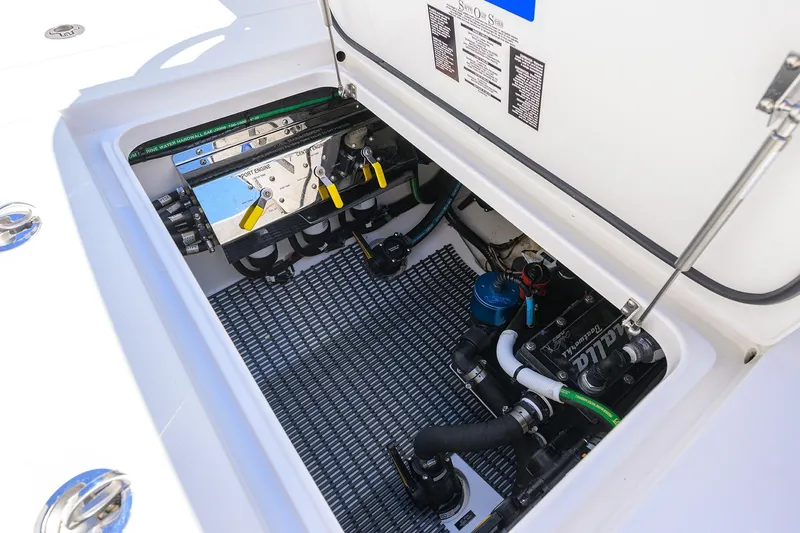 Slide: The Image of 2025 Valhalla V-37 boat engine compartment with visible components and wiring. - 56