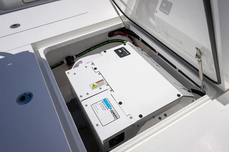 Slide: The Image of 2025 Valhalla V-37 boat compartment with electrical equipment and wiring. - 57