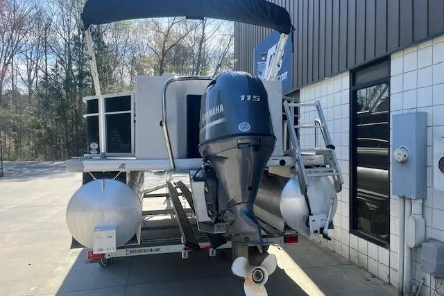 Slide: The Image of 2023 Godfrey Sweetwater 2286 FS pontoon boat with Yamaha 115 engine, docked outdoors. - 4