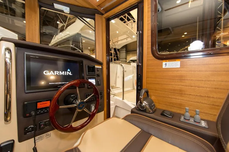 Slide: The Image of Manufacturer Provided Image: 2019 Ranger Tugs R-31 CB helm with Garmin navigation system. - 13