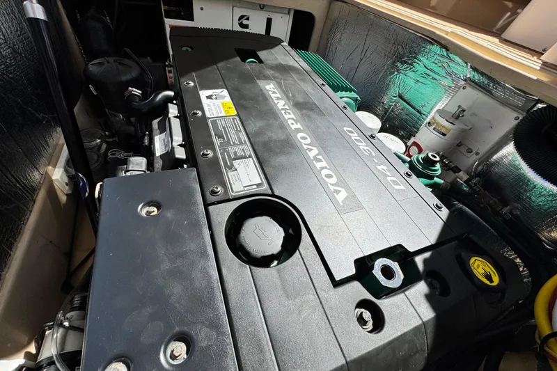 Slide: The Image of Engine compartment of 2019 Ranger Tugs R-31 CB with Volvo Penta D4-300 engine. - 24
