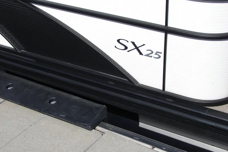 Slide: The Image of 2019 Bennington SX 25 SCWXP boat detail with model name visible. - 16
