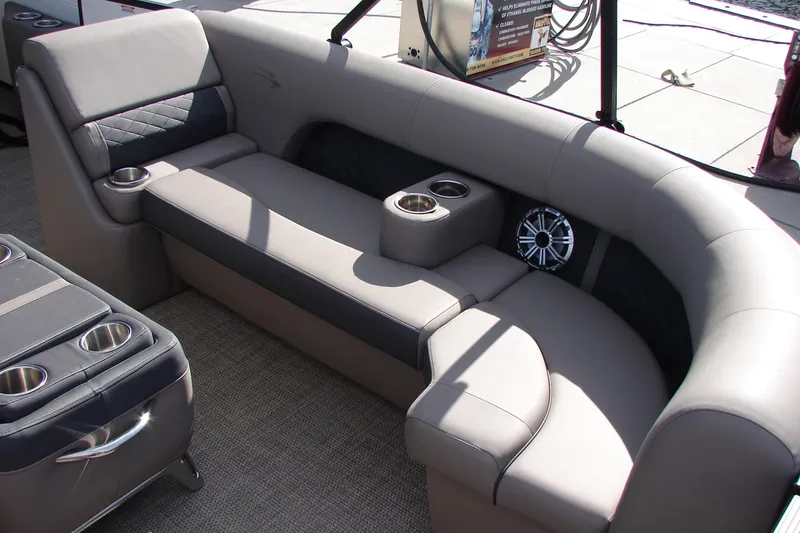 Slide: The Image of Luxurious seating on 2019 Bennington SX 25 SCWXP pontoon boat with cup holders and speaker. - 20