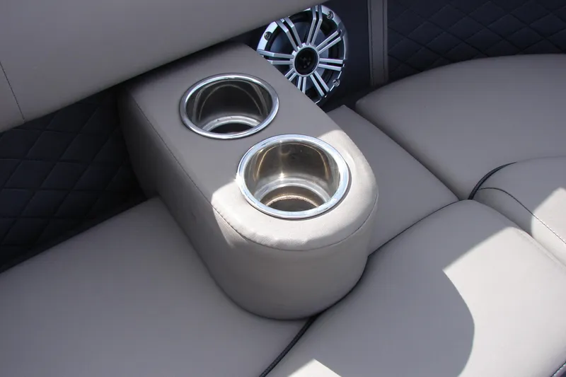 Slide: The Image of Luxurious seating with cup holders in 2019 Bennington SX 25 SCWXP boat interior. - 36