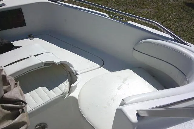 Slide: The Image of 2005 Sea Pro 195 Fish & Ski boat interior with white seating and clean design. - 12