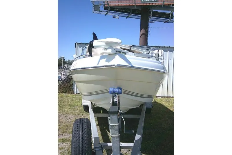 Slide: The Image of 2005 Sea Pro 195 Fish & Ski boat on trailer, parked outdoors. - 2