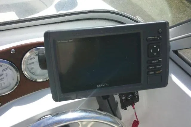 Slide: The Image of Garmin GPS device on 2005 Sea Pro 195 Fish & Ski boat dashboard. - 23