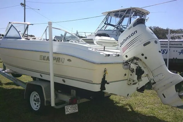Slide: The Image of 2005 Sea Pro 195 Fish & Ski boat with Johnson outboard motor on trailer. - 5