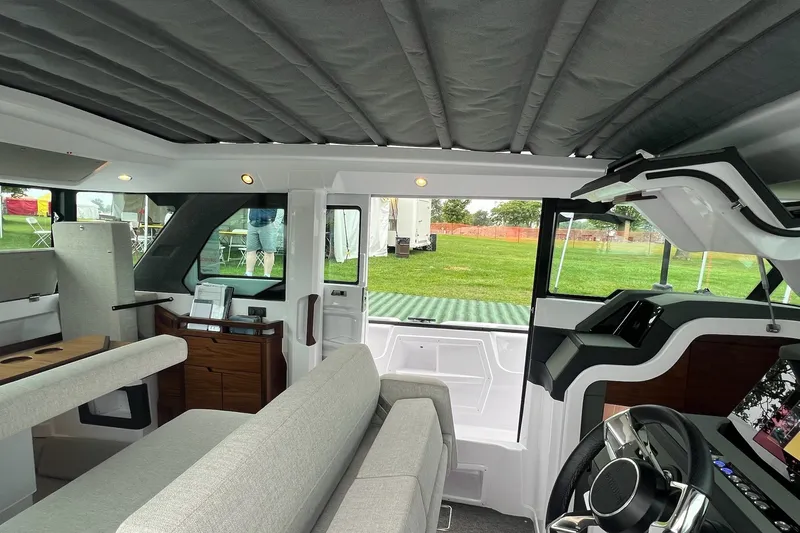 Slide: The Image of Interior of 2027 Axopar 38 Cross Cabin, featuring modern design and comfortable seating. - 37