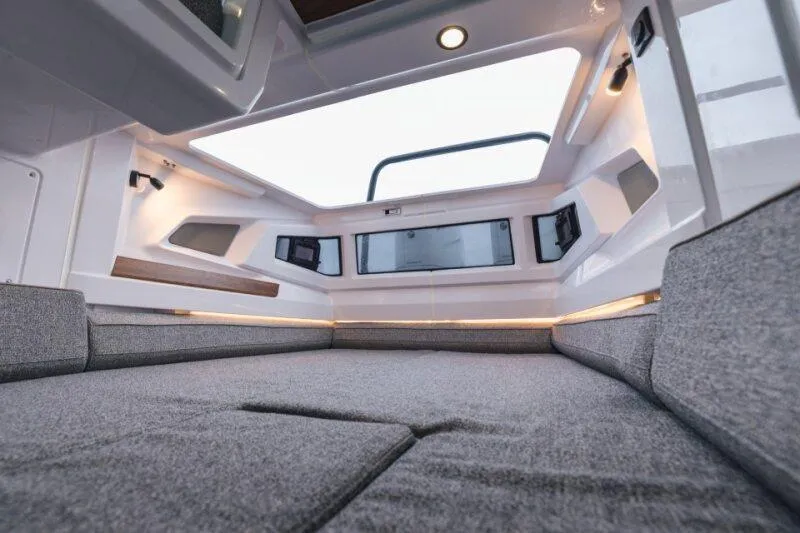 Slide: The Image of Interior view of 2026 Axopar 38 Cross Cabin, featuring modern design and comfortable seating. - 18