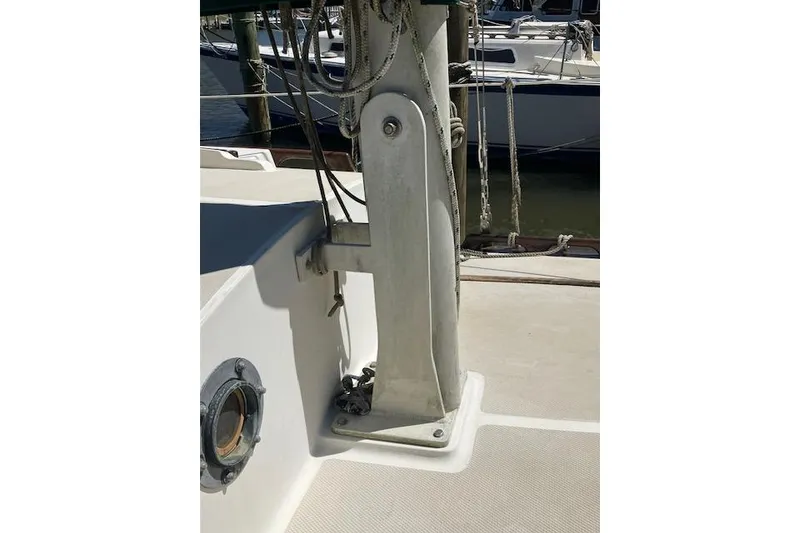 Slide: The Image of Close-up of a 1982 Falmouth Cutter 22 sailboat deck with rigging details. - 19
