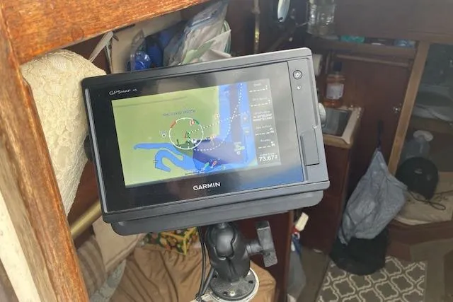 Slide: The Image of Garmin GPS device inside a 1982 Falmouth Cutter 22 sailboat cabin. - 27
