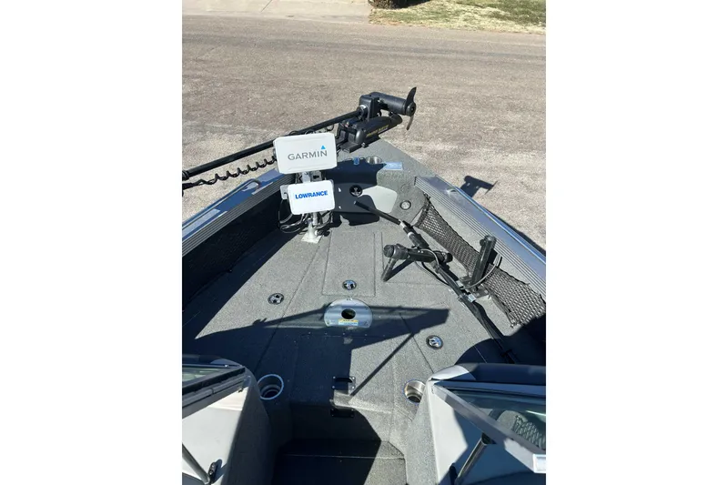 Slide: The Image of 2015 Lund 1900 Tyee boat deck with Garmin and Lowrance equipment. - 6