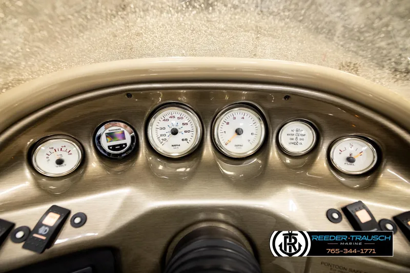 Slide: The Image of Dashboard of 2004 Smoker Craft 820 Infinity Cruise with gauges and controls. - 31