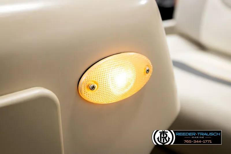 Slide: The Image of Close-up of a 2004 Smoker Craft 820 Infinity Cruise boat light. - 39