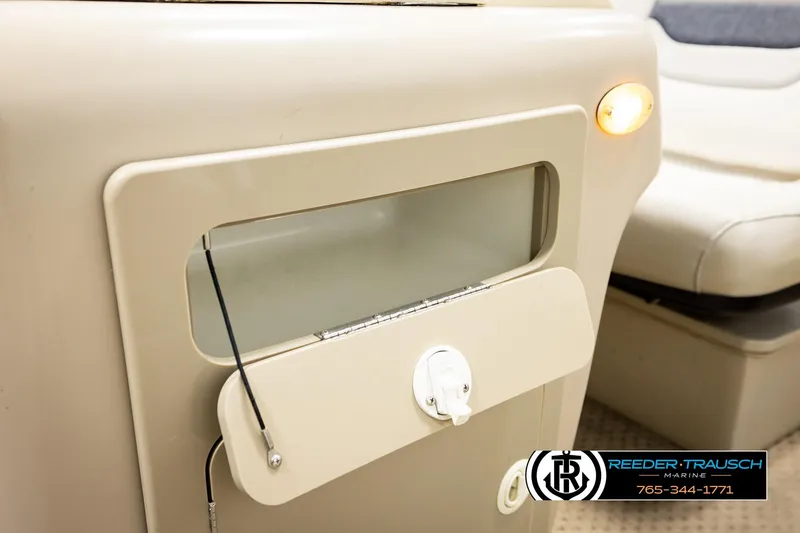 Slide: The Image of 2004 Smoker Craft 820 Infinity Cruise interior detail with storage compartment and seating. - 40