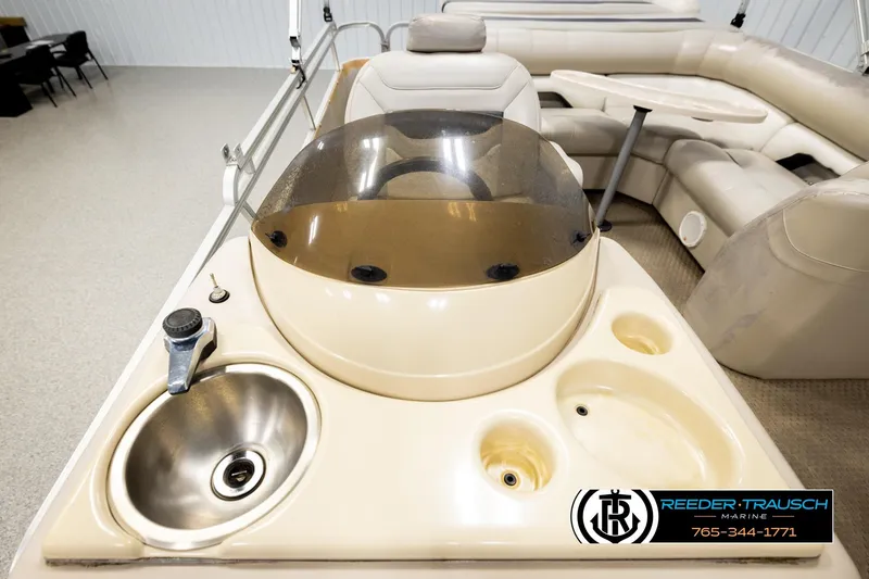 Slide: The Image of 2004 Smoker Craft 820 Infinity Cruise boat interior with sink and seating area. - 41